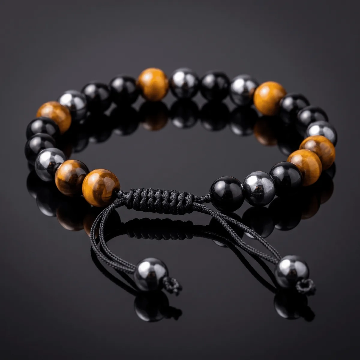 SHIELD OF STRENGTH HEMATITE & TIGER EYE BRACELET